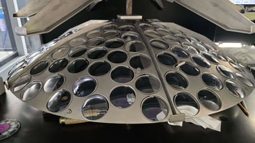 Dome used for anti-reflective application on lenses.