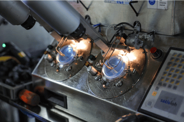 Ophthalmic lenses undergoing precision processing in IcareLabs optical lab equipment